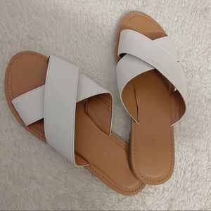 White cross cross strapped sandals